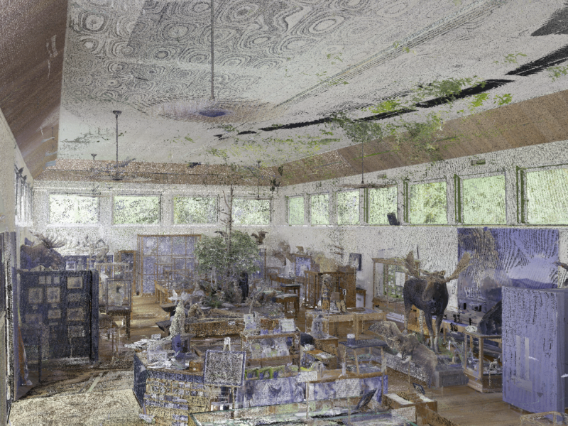 Deviation analysis overlay on LiDAR point-cloud scan showing wall bowing percentages at Libby Museum