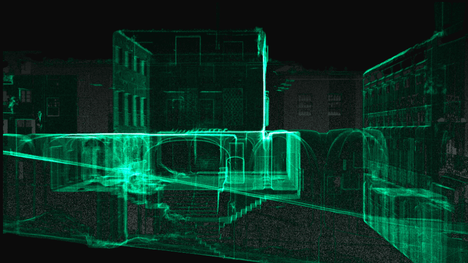 Neon-green wireframe 3D laser scan of a construction site exterior highlighting structural safety details